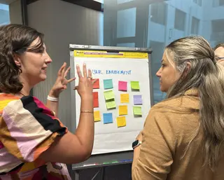 2025 Not-a-Bot participants brain storm ways AI can assist in user engagement