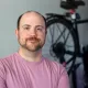 photo of dustin leblanc om front of a bicycle