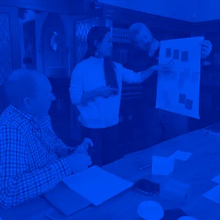 Capellic team members Joel and Bill collaborate with a client at a discovery workshop