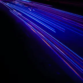 Streaks of mostly blue light in the dark