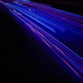 Streaks of mostly blue light in the dark